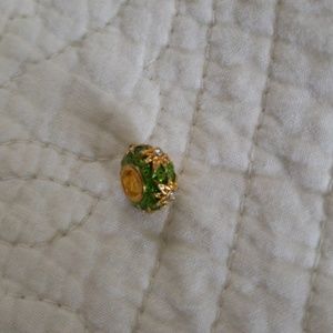 Green and gold bead